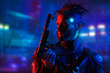 © Andrey Kiselev - courageous cyberpunk with gun