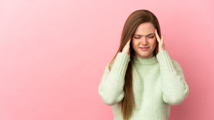 Sticker - Teenager girl over isolated pink background with headache