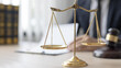 © Puwasit Inyavileart - Lawyers or judges sign documents in accordance with legal and fair terms of agreement, Legal Ethics and Integrity, scales of justice, law hammer, Litigation and legal services.