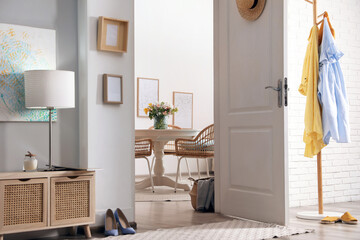 Poster - light hallway with open door to room. interior design