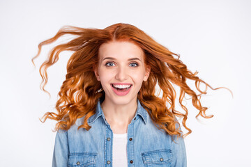 Wall Mural - Photo of amazed, excited young woman smile good mood fly hair sale news isolated on grey color background