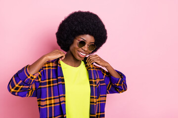 Sticker - Portrait of attractive cheerful girl wearing cozy comfort checked shirt isolated over pink pastel color background