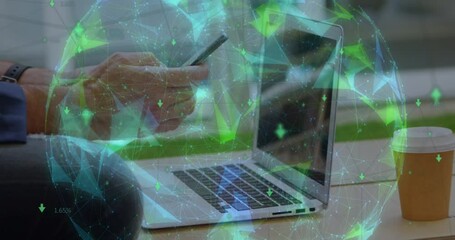 Poster - Globe of plexus network spinning against against mid section of man with laptop using smartphone