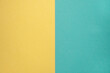 © Firuza - Two colored papers with a blue and yellow overlay on the floor. they divide half of the image. Dual background, flat lay. High quality photo
