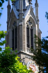 Clock tower of protestant church of Zurich Unterstrass at a beautiful summe morning. Photo taken July 2nd, 2021, Zurich, Switzerland.