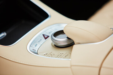 Wall Mural - Detail of modern car interior, gear stick