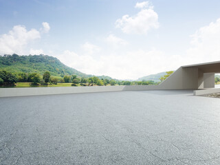 Abstract architecture design of modern building. Empty parking area floor and concrete wall with mountain and blue sky lake view. 3D rendering background image for car scene.