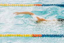 Paralympic Swimmer Training In Pool