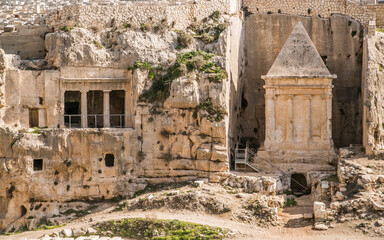 View of Benei Hezir Tomb and Tomb of Zecharian in the Kidron Valley (Cendron Valley, Qidron Valley, Valley of Jehoshaphat), Jerusalem, Israel, Midlle East. Ancient memorial for biblical figure.