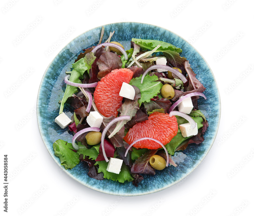 Plate with tasty grapefruit salad on white background