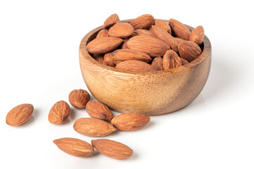 Almonds in a bowl isolated on white background.