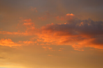 Poster - beautiful sky with orange clouds. sunset light