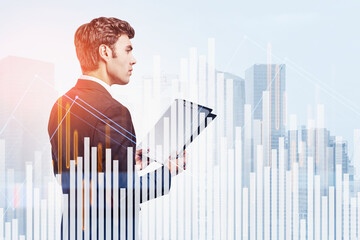 Poster - Side view of businessman with clipboard pondering about stock ma