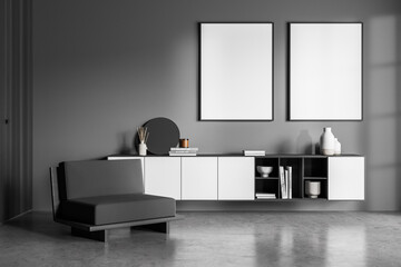 Two banners on the wall of dark waiting room with sofa, shelf