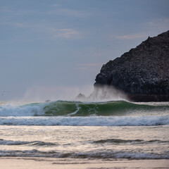 Wall Mural - absolutely stunning landscape images of holywell bay beach in cornwall uk during golden hojur sunset