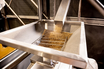 Wall Mural - The technological process of grinding malt seeds at the mill