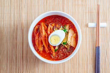 spicy buckwheat noodles with marinated dried pollack, Korean food 'kodari naengmyeon'