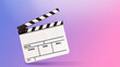Clapper board or movie slate. its uses in video production, film, cinema industry put on pink and blue gradient backgrounds.