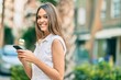 © Krakenimages.com - Beautiful latin teenager girl smiling happy using smartphone at the city.