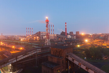 factory worker lights at night