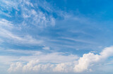 Fototapeta Niebo - Blue sky and white fluffy clouds background and pattern