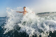 © Mediteraneo - Happy child playing in the sea. Kid having fun outdoors. Summer vacation and healthy lifestyle concept. Selective focus