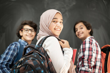 Group of multy ethnic kids in classroom space