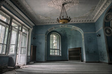 A Beautiful Room With Shabby Walls In An Old Abandoned House. Abandoned Haunted Manor. Ancient Architecture And Interiors.