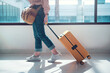 © oatawa - Closeup - Travel tourist with luggage or suitcase in airport terminal