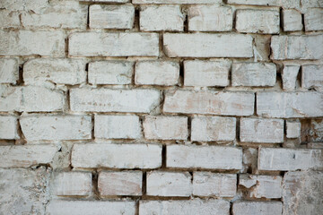 Poster - Abstract old white brick wall. background facade brick wall black and white. Vintage old brick wall texture. Grunge stone wall horizontal background. Dilapidated building facade with damaged plaster.