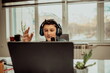 © Minet - little boy using laptop and headphones studying math during his online lesson at home, social distance during quarantine, self-isolation. takes notes. E-Education Distance Home Education.