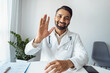 © Stock 4 You - Headshot portrait of positive smiling indian man doctor in uniform saying hi