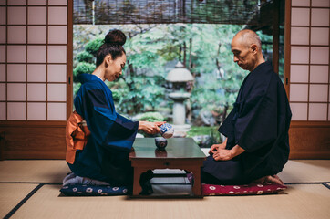 Wall Mural - Senior couple lifestyle moments in a traditional japanese house