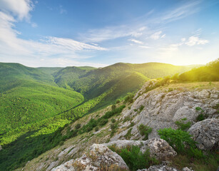 Wall Mural - Green mountain hills during the sunset