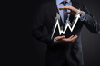© Ivan - Businessman hold sales data and economic growth graph chart. Business planning and strategy. Analysing trading of exchange. Financial and banking. Technology digital marketing.Profit and growing plan.