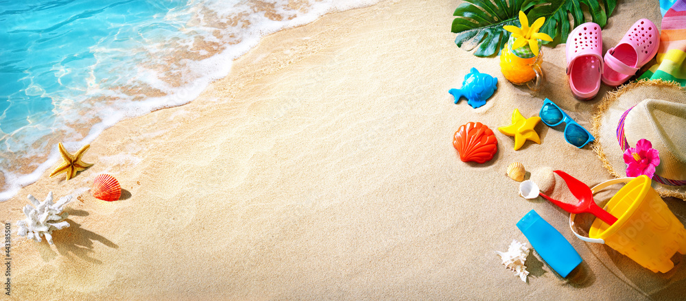 Ocean sand beach with sunbathing accessories - obrazy, fototapety, plakaty 