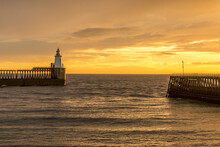 A Glorious Morning At Blyth Beach, With A Beautiful Sunrise Over The Old Wooden Pier Stretching Out To The North Sea