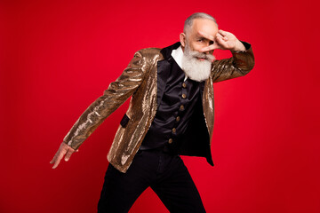 Poster - Portrait of attractive chic classy funky grey-haired man dancing showing v-sign isolated over bright red color background