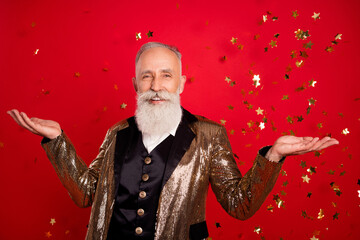 Poster - Photo of optimistic beard elder magician man with decoration wear gold jacket isolated on red color background