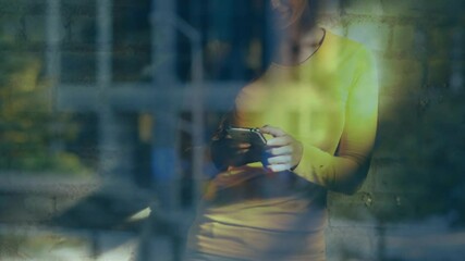 Poster - Animation of woman using smartphone over cityscape