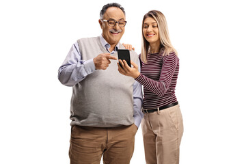 Canvas Print - Happy father and daughter looking at a mobile phone