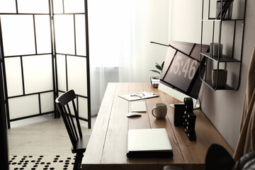 Poster - Modern workplace with computer in room. Interior design