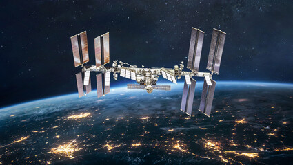 Leinwandbilder - ISS station on orbit of the Earth planet. View from outer space. International space station. Earth at night. Elements of this image furnished by NASA