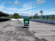 Abandoned Supermarket Car Park With Shopping Trolley