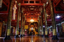 Inside The Chapel Of The Sri Don Chai Temple, Which Is The First Temple Of Pai, Mae Hong Son Province, THAILAND. Interior Is Decorated With Old Wood And Gold.