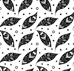 Seamless monochrome pattern with petals and folk decoration. Texture with black leaves with tribal ornament and dots on white background. Simple vector wallpaper with falling leaves. Natural fabric