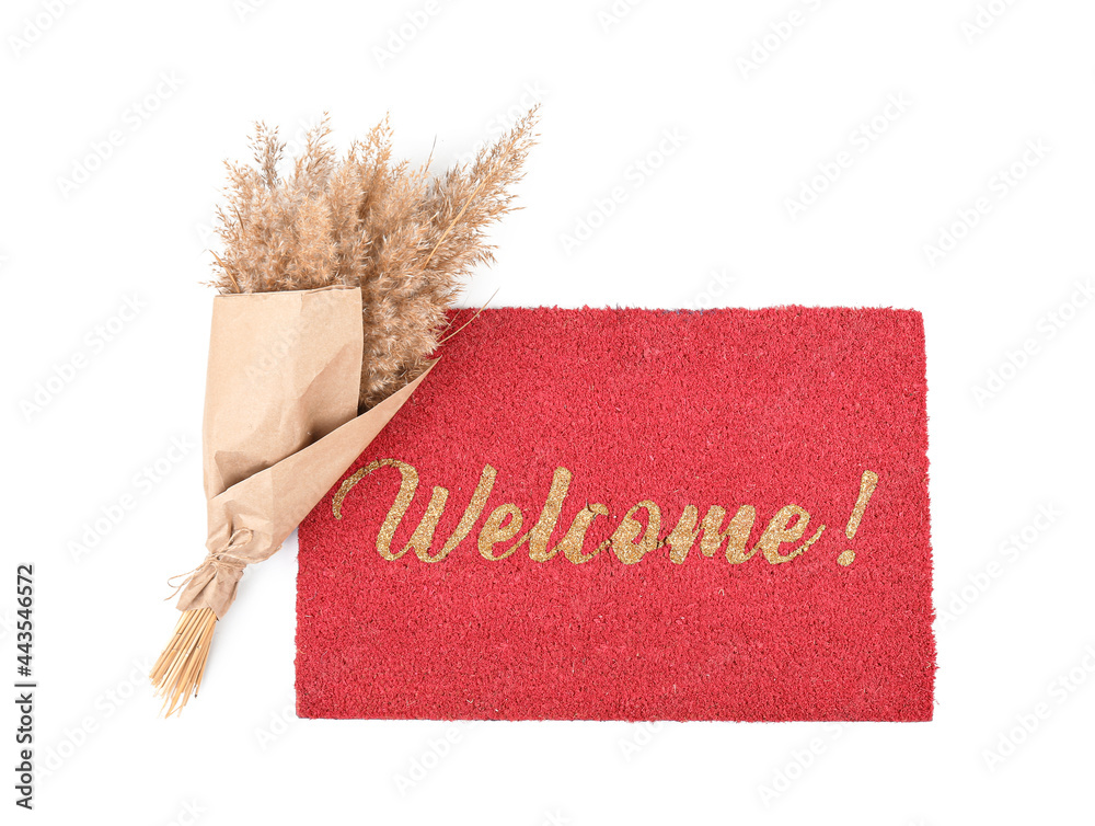 Doormat with bouquet on white background