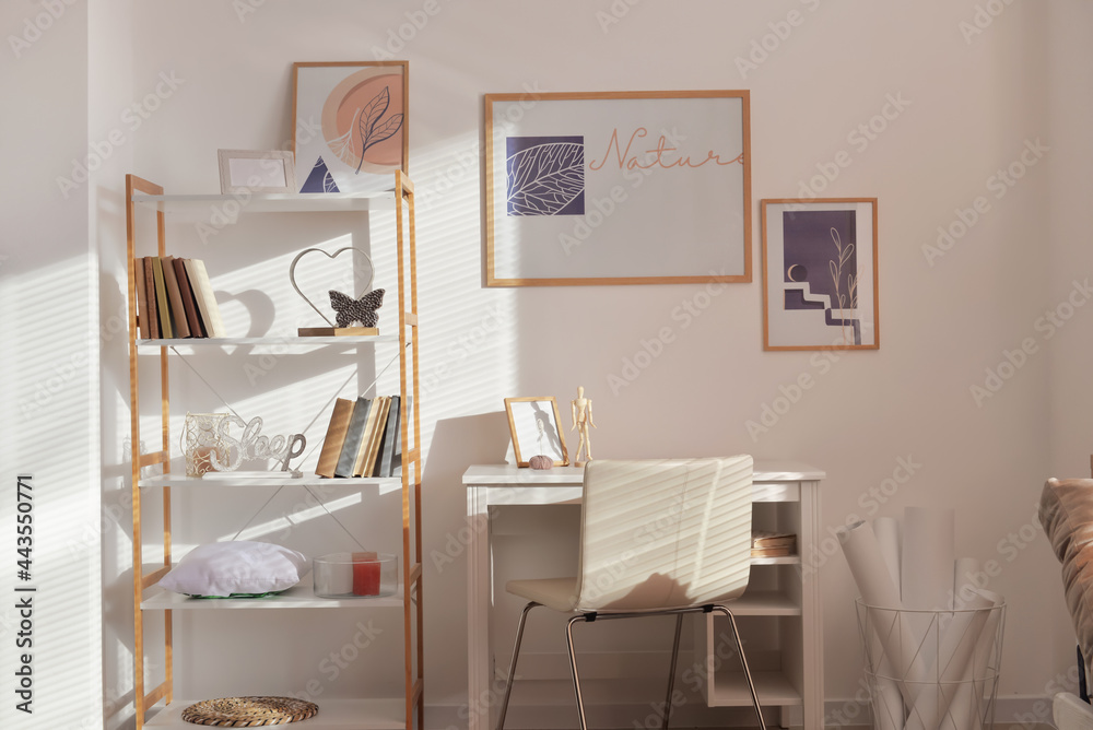 Interior of stylish room with modern workplace