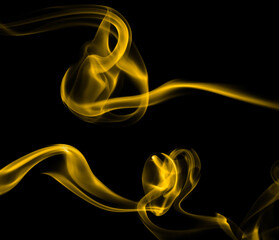 gold smoke isolated black background	
