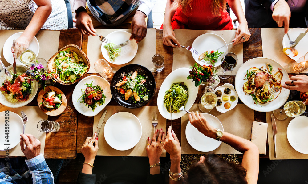 Aerial view of a table full of food - obrazy, fototapety, plakaty 